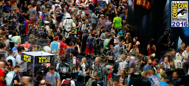 Attendees crowd the convention floor during opening day of Comic-Con International in San Diego, California